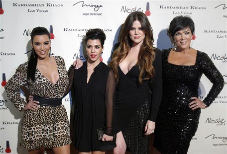 Television personalities Kim Kardashian, Kourtney Kardashian, Khloe Kardashian and Kris Jenner arrive at the grand opening of the Kardashian Television personalities Kim Kardashian, Kourtney Kardashian, Khloe Kardashian and Kris Jenner arrive at the grand opening of the Kardashian