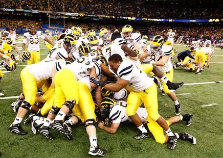 Michigan Wolverines after Sugar Bowl victory courtesy: REUTERS/Jon Bachman Michigan Wolverines after Sugar Bowl victory courtesy: REUTERS/Jon Bachman