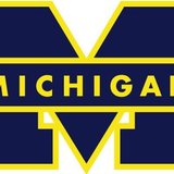 The Michigan Wolverines logo is shown in a stock image. The Michigan Wolverines logo is shown in a stock image.