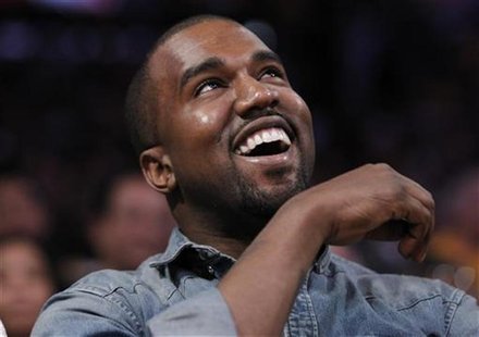 Recording artist Kanye West sits courtside as he attends the NBA basketball game between the Lakers and Bulls in Los Angeles Recording artist Kanye West sits courtside as he attends the NBA basketball game between the Lakers and Bulls in Los Angeles