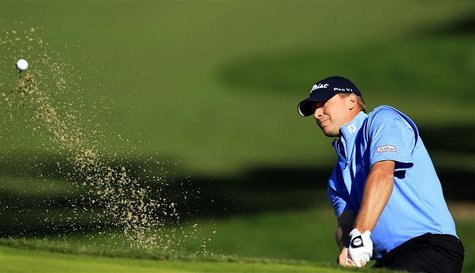 Steve Stricker hits out of a bunker of the fifth hole during the first round of the Chevron World Challenge PGA golf tournament in Thousand Steve Stricker hits out of a bunker of the fifth hole during the first round of the Chevron World Challenge PGA golf tournament in Thousand