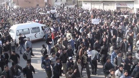 Demonstrators wait for the arrival of Arab League observers in Deir Balaba Demonstrators wait for the arrival of Arab League observers in Deir Balaba