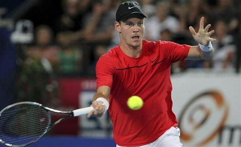 Tomas Berdych of Czech Republic returns a shot to Richard Gasquet of France during their 2012 Hopman Cup tennis final in Perth Tomas Berdych of Czech Republic returns a shot to Richard Gasquet of France during their 2012 Hopman Cup tennis final in Perth