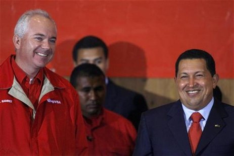 Venezuelan President Chavez and Oil Minister Ramirez attend an event to celebrate victory over Exxon Mobil in Caracas Venezuelan President Chavez and Oil Minister Ramirez attend an event to celebrate victory over Exxon Mobil in Caracas