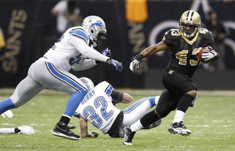 New Orleans Saints running back Sproles avoids Detroit Lions outside linebacker Durant during the third quarter of their NFL NFC wildcard pl New Orleans Saints running back Sproles avoids Detroit Lions outside linebacker Durant during the third quarter of their NFL NFC wildcard pl