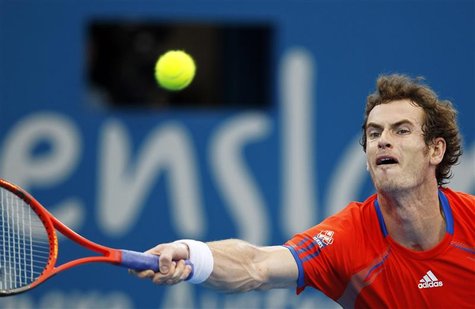 Murray of Britain hits a return to Dolgopolov of Ukraine during their men's final match at the Brisbane International tennis tournament Murray of Britain hits a return to Dolgopolov of Ukraine during their men's final match at the Brisbane International tennis tournament