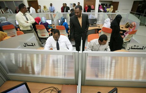 Traders work during the opening of the new electronic trading Khartoum Stock Exchange Traders work during the opening of the new electronic trading Khartoum Stock Exchange
