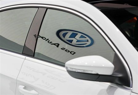 The Volkwagen logo is seen reflected on the window of the newly-designed 2013 Volkswagen CC at the LA Auto Show in Los Angeles The Volkwagen logo is seen reflected on the window of the newly-designed 2013 Volkswagen CC at the LA Auto Show in Los Angeles