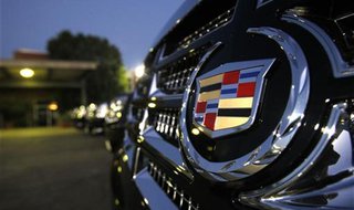 Vehicles for sale are parked at a Cadillac dealer in Sherman Oaks Vehicles for sale are parked at a Cadillac dealer in Sherman Oaks