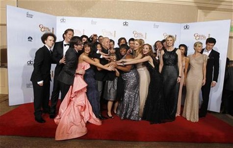 Murphy, creator of the TV series 'Glee', and cast members pose with the award for best television comedy series at the 68th annual Golden Gl Murphy, creator of the TV series 'Glee', and cast members pose with the award for best television comedy series at the 68th annual Golden Gl