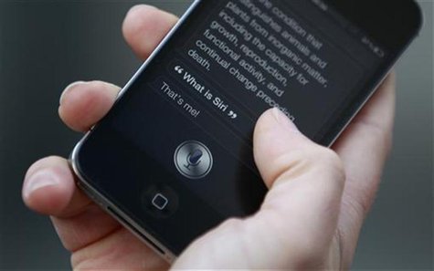 Luke Peters demonstrates Siri, an application which uses voice recognition and detection on the iPhone 4S, outside the Apple store in Covent Luke Peters demonstrates Siri, an application which uses voice recognition and detection on the iPhone 4S, outside the Apple store in Covent