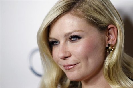 Cast member Dunst poses at a screening of the film "Melancholia" during AFI Fest 2011 in Hollywood Cast member Dunst poses at a screening of the film "Melancholia" during AFI Fest 2011 in Hollywood