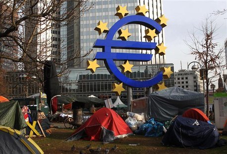 Tents of 'Occupy Frankfurt' movement are pictured next to Euro currency sign sculpture in front of ECB headquarters in Frankfurt. Tents of 'Occupy Frankfurt' movement are pictured next to Euro currency sign sculpture in front of ECB headquarters in Frankfurt.