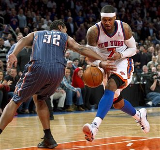Charlotte Bobcats' Diaw fouls New York Knicks' Anthony during their NBA basketball game in New York Charlotte Bobcats' Diaw fouls New York Knicks' Anthony during their NBA basketball game in New York