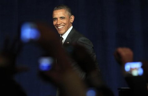 U.S. President Barack Obama smiles as he arrives on stage to speak at a campaign event in Washington U.S. President Barack Obama smiles as he arrives on stage to speak at a campaign event in Washington
