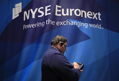 A trader works on the floor of the New York Stock Exchange A trader works on the floor of the New York Stock Exchange