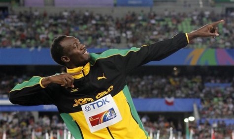 Gold medallist Bolt of Jamaica poses during the award ceremony for the men's 200 metres final at the IAAF World Athletics Championships in D Gold medallist Bolt of Jamaica poses during the award ceremony for the men's 200 metres final at the IAAF World Athletics Championships in D