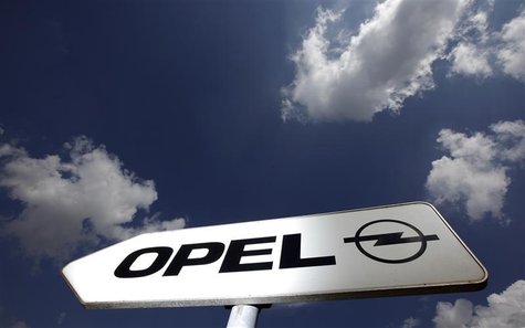 A sign indicates the way towards the headquarters of German car manufacturer Opel in Ruesselsheim