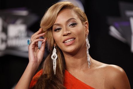 Singer Beyonce poses at the 2011 MTV Video Music Awards in Los Angeles Singer Beyonce poses at the 2011 MTV Video Music Awards in Los Angeles