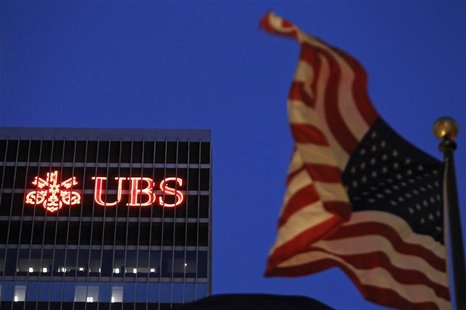 An U.S. flag flies in front of a UBS building in New York An U.S. flag flies in front of a UBS building in New York