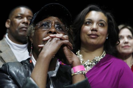 Supporters listen to U.S. President Barack Obama talk at a Chicago Forum event at the University of Illinois in Chicago Supporters listen to U.S. President Barack Obama talk at a Chicago Forum event at the University of Illinois in Chicago