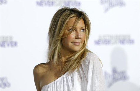 Actress Heather Locklear poses at the premiere of the documentary "Justin Bieber: Never Say Never" at Nokia theatre in Los Angeles Actress Heather Locklear poses at the premiere of the documentary "Justin Bieber: Never Say Never" at Nokia theatre in Los Angeles
