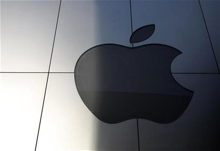An Apple logo is seen with its light switched off at an Apple store in Tokyo An Apple logo is seen with its light switched off at an Apple store in Tokyo