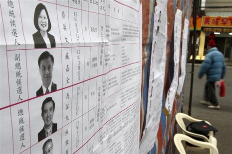 The list of presidential and vice presidential candidates are seen on a board at a polling station during Taiwan presidential and legislativ The list of presidential and vice presidential candidates are seen on a board at a polling station during Taiwan presidential and legislativ