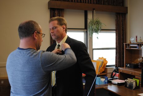 Mayor Bob Ryan gets a microphone before his interview with NBC's John Yang Thursday. Mayor Bob Ryan gets a microphone before his interview with NBC's John Yang Thursday.