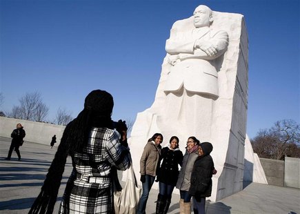 Women have their photo taken at the Martin Luther King, Jr. memorial on his 83rd birthday in Washington Women have their photo taken at the Martin Luther King, Jr. memorial on his 83rd birthday in Washington