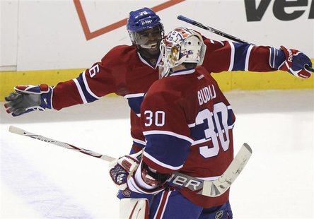 Canadiens goalie Budaj is congratulated on win over Rangers by teammate Subban following third period NHL hockey action in Montreal Canadiens goalie Budaj is congratulated on win over Rangers by teammate Subban following third period NHL hockey action in Montreal