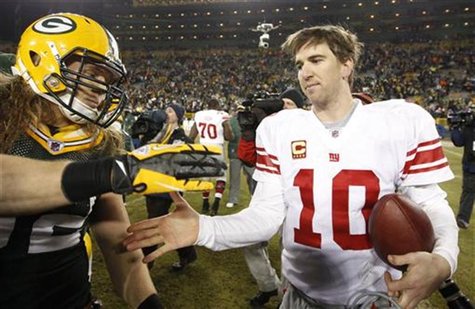 New York Giants quarterback Manning shakes hands with Green Bay Packers Matthews after the Giants defeated the Packers in the NFL NFC Divisi New York Giants quarterback Manning shakes hands with Green Bay Packers Matthews after the Giants defeated the Packers in the NFL NFC Divisi