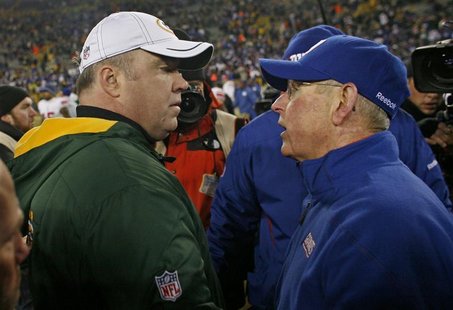 New York Giants coach Coughlin talks with Green Bay Packers coach McCarthy after the Giants defeated the Packers during their NFL NFC Divisi New York Giants coach Coughlin talks with Green Bay Packers coach McCarthy after the Giants defeated the Packers during their NFL NFC Divisi