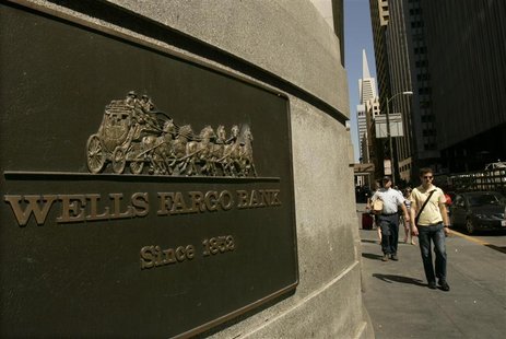 A pedestrian walks past a Wells Fargo & Co bank in San Francisco A pedestrian walks past a Wells Fargo & Co bank in San Francisco