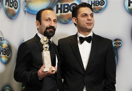Director Farhadi and actor Moadi pose with the award for best foreign film for "A Separation" as they arrive at the HBO after party after at Director Farhadi and actor Moadi pose with the award for best foreign film for "A Separation" as they arrive at the HBO after party after at