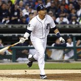 Detroit Tigers' Victor Martinez watches his RBI triple against the Texas Rangers in Game 5 in their MLB ALCS baseball playoffs in Detroit Detroit Tigers' Victor Martinez watches his RBI triple against the Texas Rangers in Game 5 in their MLB ALCS baseball playoffs in Detroit