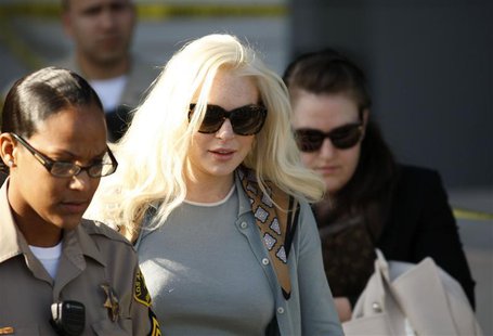 Actress Lindsay Lohan leaves the court after a progress report hearing in Los Angeles. Actress Lindsay Lohan leaves the court after a progress report hearing in Los Angeles.