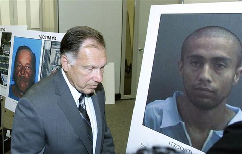 Rackauckas leaves a news conference after he announced that he will file four felony counts of murder against Ocampo at the district attorne Rackauckas leaves a news conference after he announced that he will file four felony counts of murder against Ocampo at the district attorne