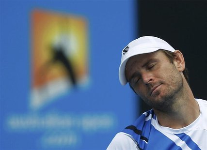 Fish of the U.S. reacts to losing a point during his men's singles match against Falla of Colombia at the Australian Open tennis tournament Fish of the U.S. reacts to losing a point during his men's singles match against Falla of Colombia at the Australian Open tennis tournament