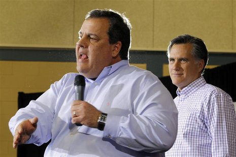 Republican presidential candidate Romney listens as New Jersey Governor Christie speaks at a campaign rally in Exeter Republican presidential candidate Romney listens as New Jersey Governor Christie speaks at a campaign rally in Exeter