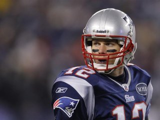 New England Patriots quarterback Tom Brady watches during a play in the third quarter of the NFL AFC Divisional playoff game against the Den