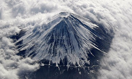 Snow-covered Mount Fuji peeks through miles of fluffy clouds
At 3,776 metres high, it is Japan's highest peak
Courtesy: Reuters Snow-covered Mount Fuji peeks through miles of fluffy clouds
At 3,776 metres high, it is Japan's highest peak
Courtesy: Reuters