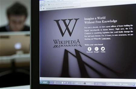 A reporter's laptop shows the Wikipedia blacked out opening page
Credit: Reuters/Yves Herman A reporter's laptop shows the Wikipedia blacked out opening page
Credit: Reuters/Yves Herman
