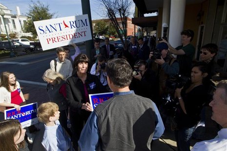 Republican presidential candidate and former Senator Rick Santorum greets supporters outside before a Faith, Family and Freedom Town Hall at Republican presidential candidate and former Senator Rick Santorum greets supporters outside before a Faith, Family and Freedom Town Hall at