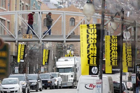 People cross Main Street before first day of Sundance Film Festival in Park City People cross Main Street before first day of Sundance Film Festival in Park City