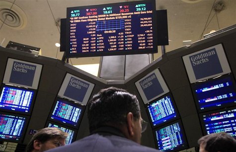 Traders gather at the Goldman Sachs post on the floor of the New York Stock Exchange Traders gather at the Goldman Sachs post on the floor of the New York Stock Exchange