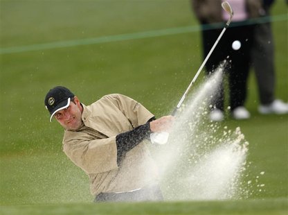 Jose Maria Olazabal of Spain hits from a sand trap on the second hole during a practice round for the 2009 Masters golf tournament at the Au Jose Maria Olazabal of Spain hits from a sand trap on the second hole during a practice round for the 2009 Masters golf tournament at the Au