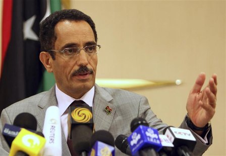 File photo of Vice Chairman of the interim NTC Ghoga announcing Keeb as the the new interim prime minister at Rixos Hotel in Tripoli File photo of Vice Chairman of the interim NTC Ghoga announcing Keeb as the the new interim prime minister at Rixos Hotel in Tripoli
