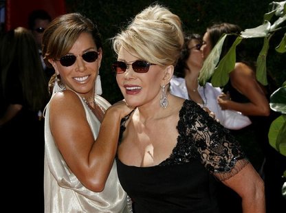 Melissa Rivers and Joan Rivers smile as they arrive for the 58th annual Primetime Emmy Awards at the Shrine Auditorium in Los Angeles Melissa Rivers and Joan Rivers smile as they arrive for the 58th annual Primetime Emmy Awards at the Shrine Auditorium in Los Angeles