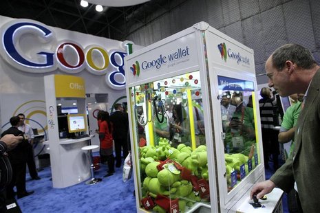 A man visits the Google stand at the National Retail Federation's Annual Convention and Expo in New York A man visits the Google stand at the National Retail Federation's Annual Convention and Expo in New York